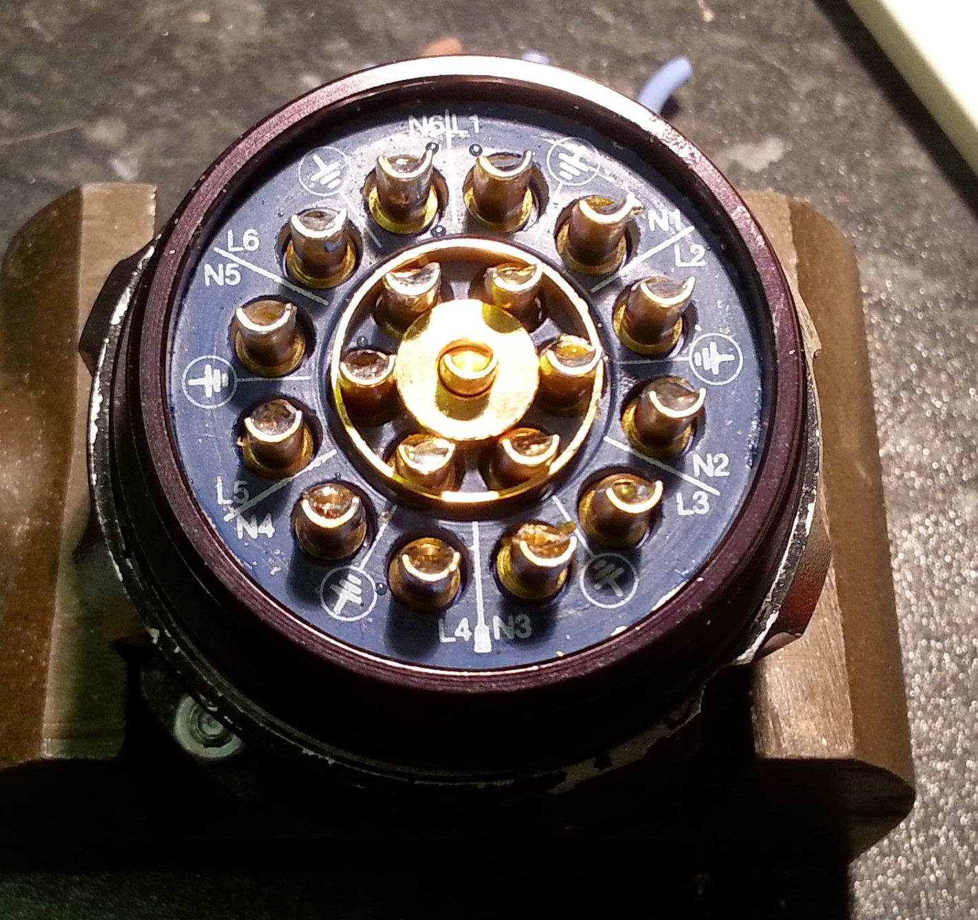 Rear of connector with ground rings and solder buckets filled